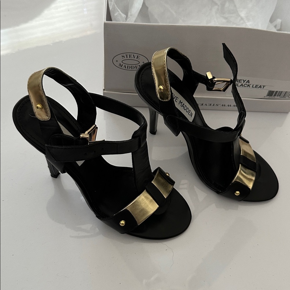 Steve Madden Rey’s black leather and gold heels